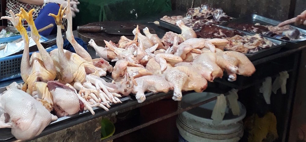 chicken on market stall in vietnam