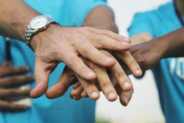 hands stacked on top of each other