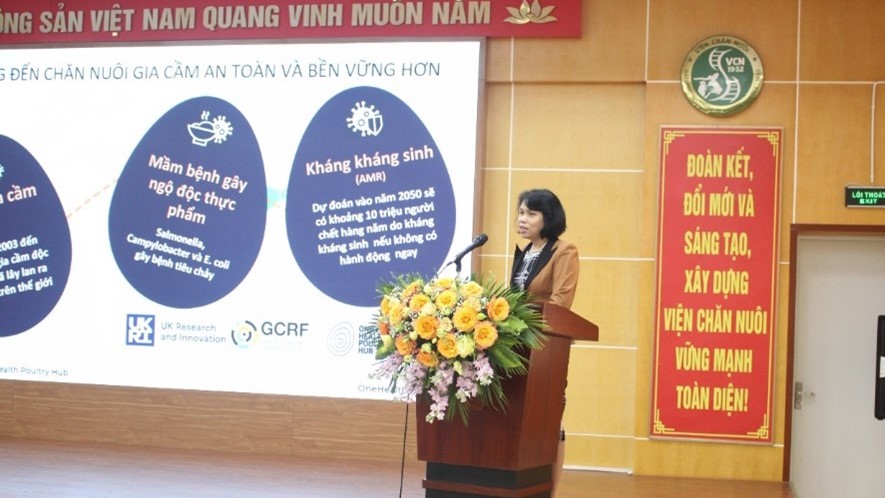 woman standing at podium presenting 