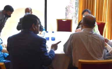 people round a table