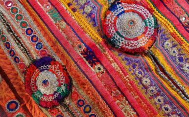 brightly coloured embroidered fabric