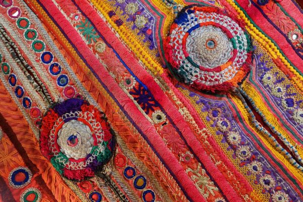 brightly coloured embroidered fabric